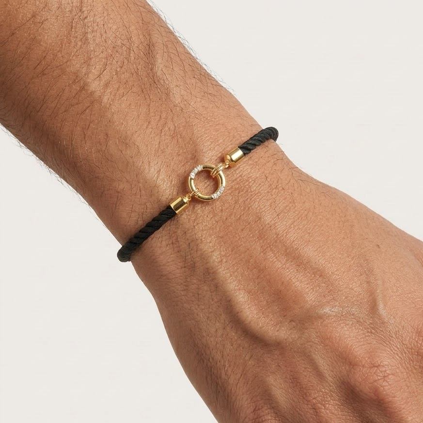 Black rope men's diamond bracelet with an 18kt gold circle charm accented by sparkling diamonds Perfect gift for him under Rs. 20,000