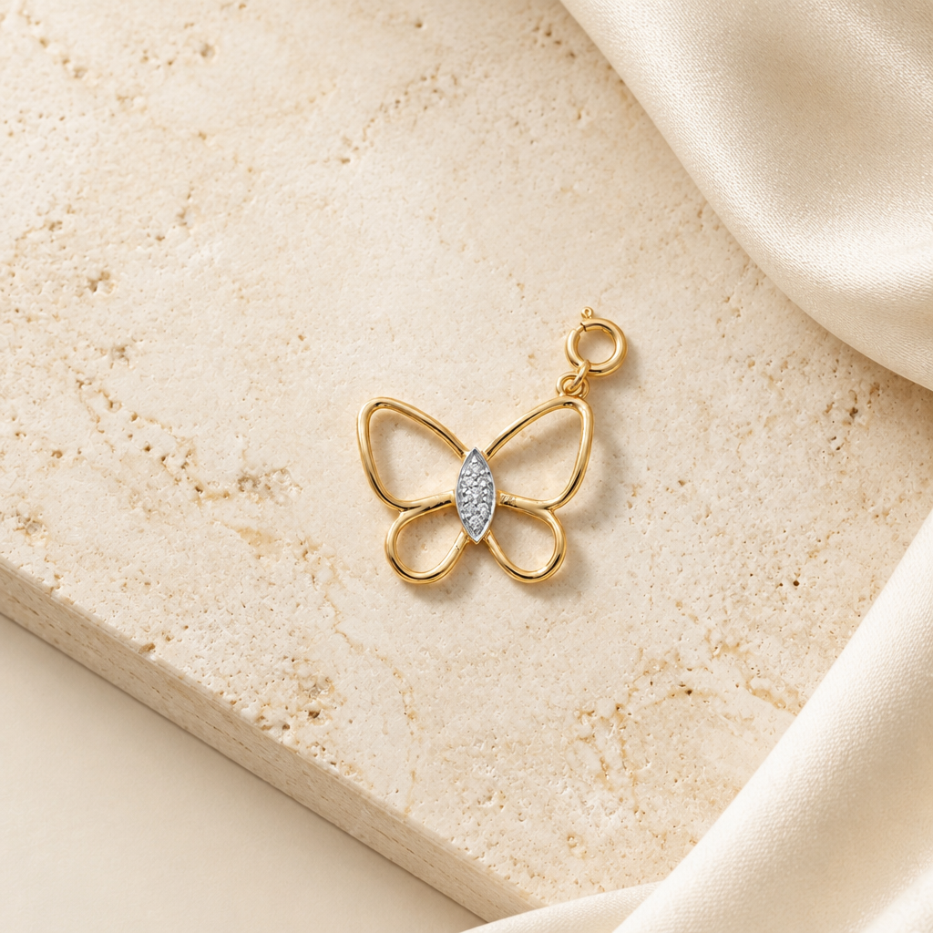 Gold open butterfly pendant with wings outlined in gold and a diamond-set body priced at Rs. 15,000