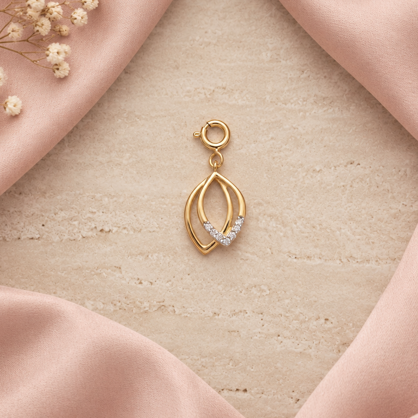 Gold layered leaf-shaped pendant set with sparkling diamond accents, Minimal and affordable gifts for her under Rs. 15,000