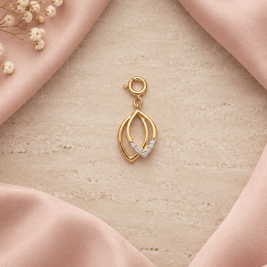 Gold layered leaf-shaped pendant set with sparkling diamond accents, Minimal and affordable gifts for her under Rs. 15,000