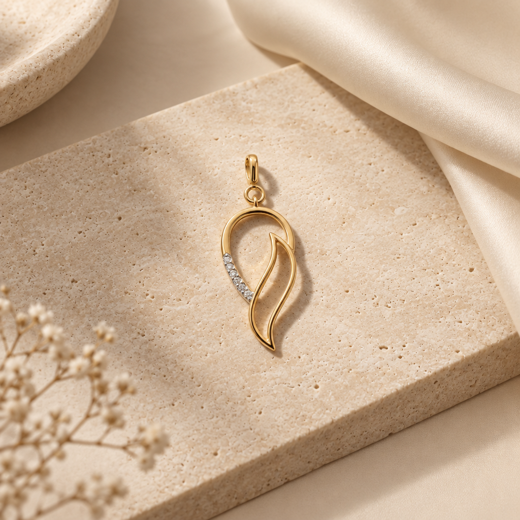 Gold conch shell-shaped pendant with a diamond-set curved detail, priced under Rs. 20,000