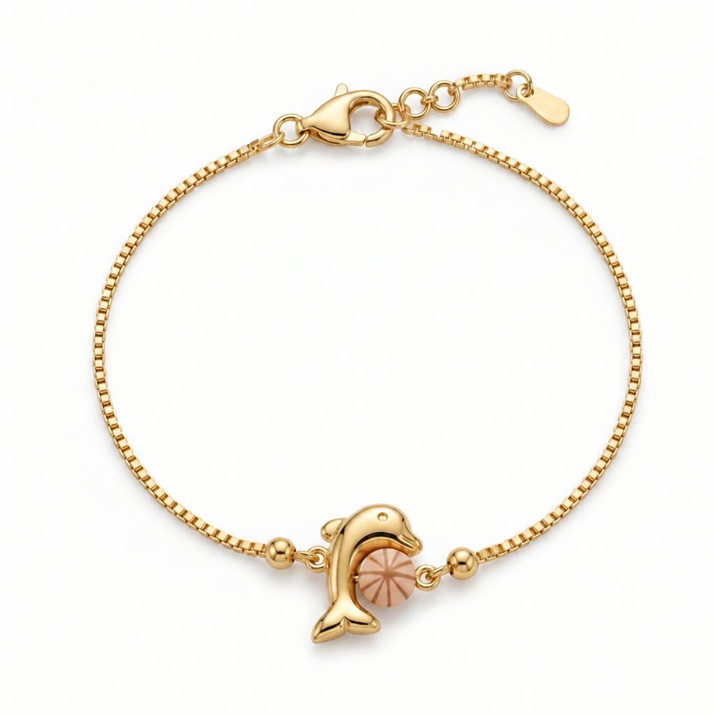 Gold box-chain bracelet with an enamel pink dolphin charm. A cute gift for kids under Rs. 40,000