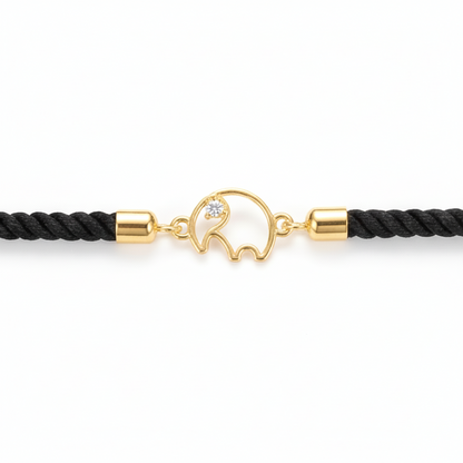 Black rope men's bracelet with an 18kt gold elephant charm and a diamond accent. A gold gift for him under Rs. 15,000