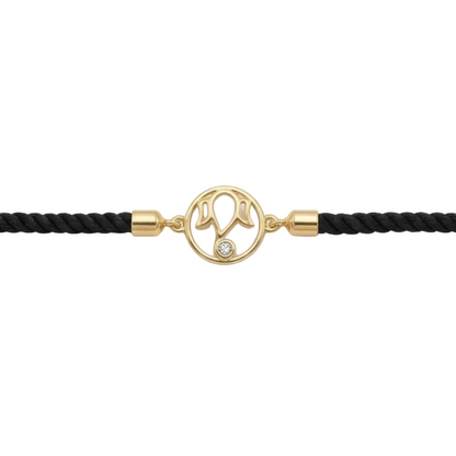 Sleek black braided cord Ganesha Bracelet centered with a polished 18kt gold deity motif and a sparkling diamond. A perfect gift for him under Rs. 20,000