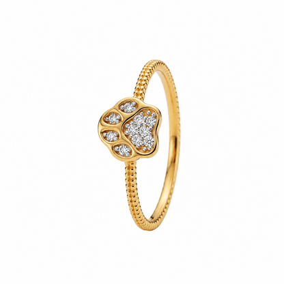Gold ring with a heart-shaped paw print charm set with sparkling diamonds under Rs. 35,000