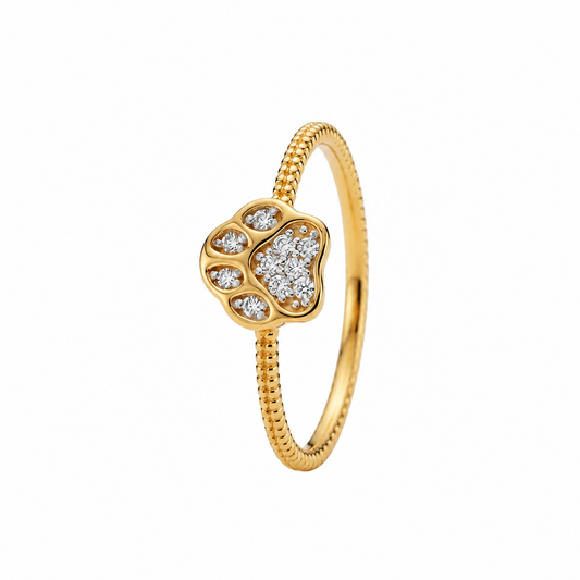 Gold ring with a heart-shaped paw print charm set with sparkling diamonds under Rs. 35,000