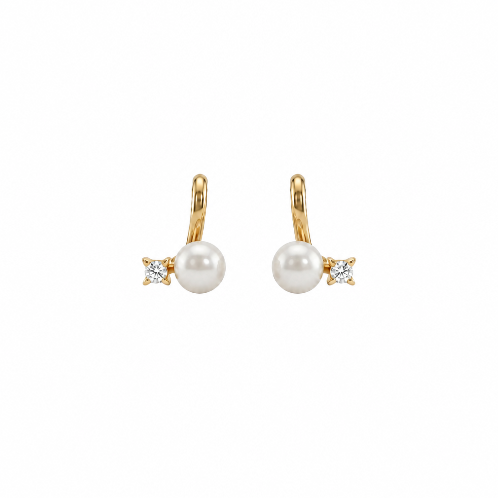 Gold huggie earrings with a white pearl drop and a diamond baguette accent, priced under Rs. 20,000