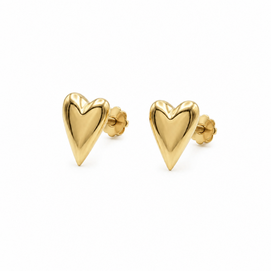 Polished gold heart-shaped stud earrings with a puffed, glossy finish. Minimal and cute gifts for her under Rs. 20,000