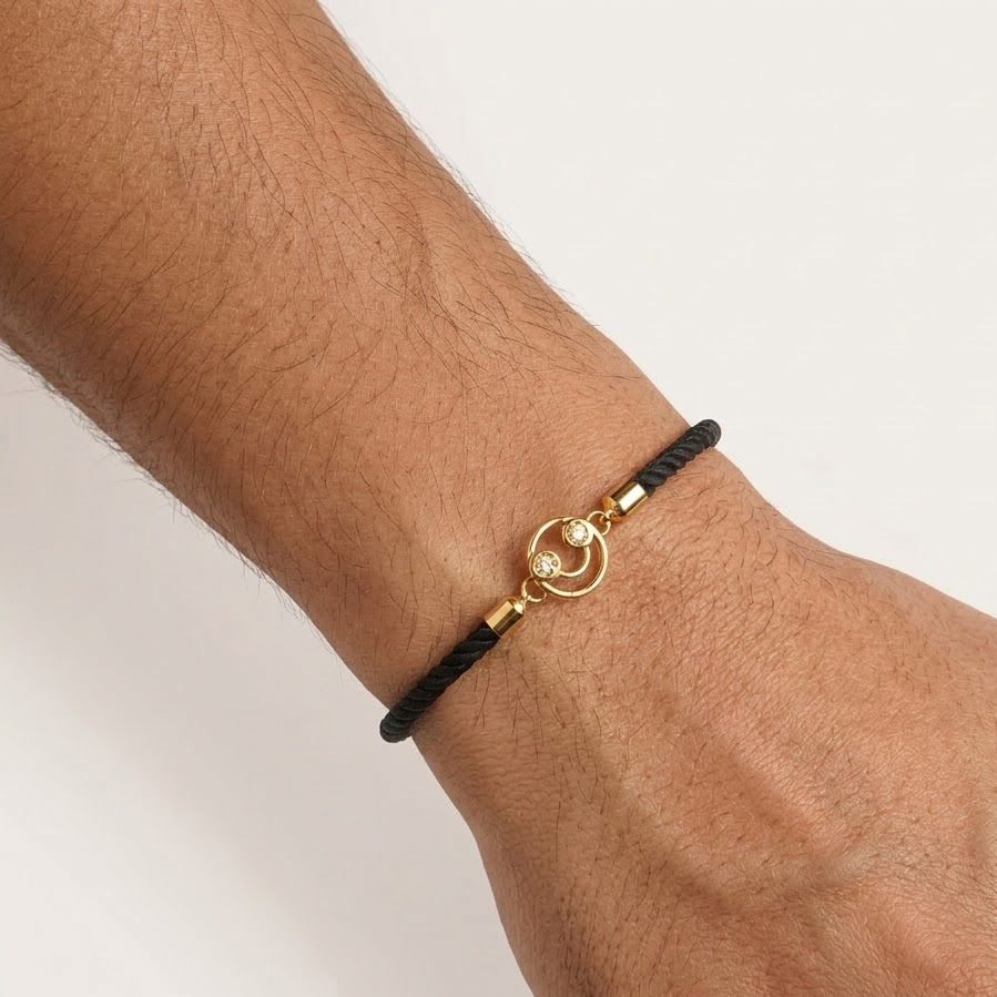 Black rope men's diamond bracelet with an 18kt gold smiley face charm. A perfect gift for him under Rs. 15,000