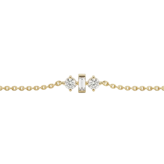 Gold chain bracelet with three sparkling diamond stones set at the center priced under Rs. 50,000