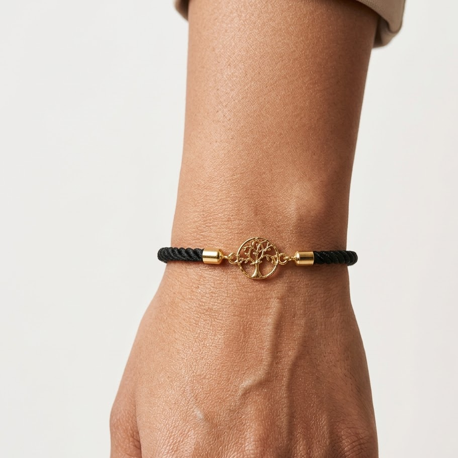 Black rope men's gold bracelet featuring an 18kt gold tree-of-life charm pendant under Rs. 15,000