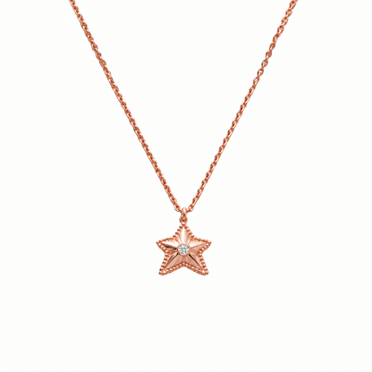 Rose gold starfish pendant necklace encrusted with sparkling stone priced under Rs. 70,000