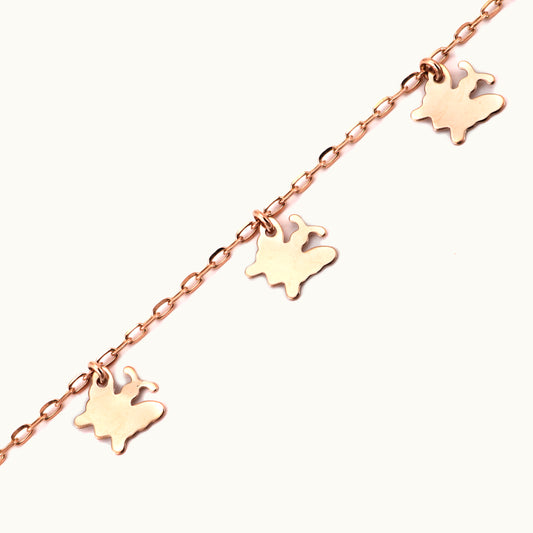 18kt gold butterfly bracelet. Fine jewellery under ₹30,000. Chic, gift-worthy charm bracelet.