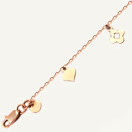 18kt hallmarked gold charm bracelet. Luxury jewellery under ₹30,000. Chic, playful, gift-worthy.