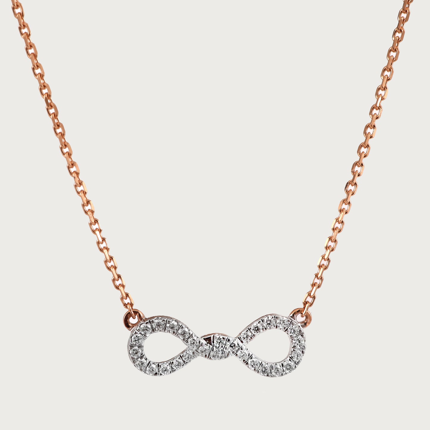 18kt gold Diamond Infinity Necklace with VVS diamonds—timeless fine jewellery under ₹60,000.