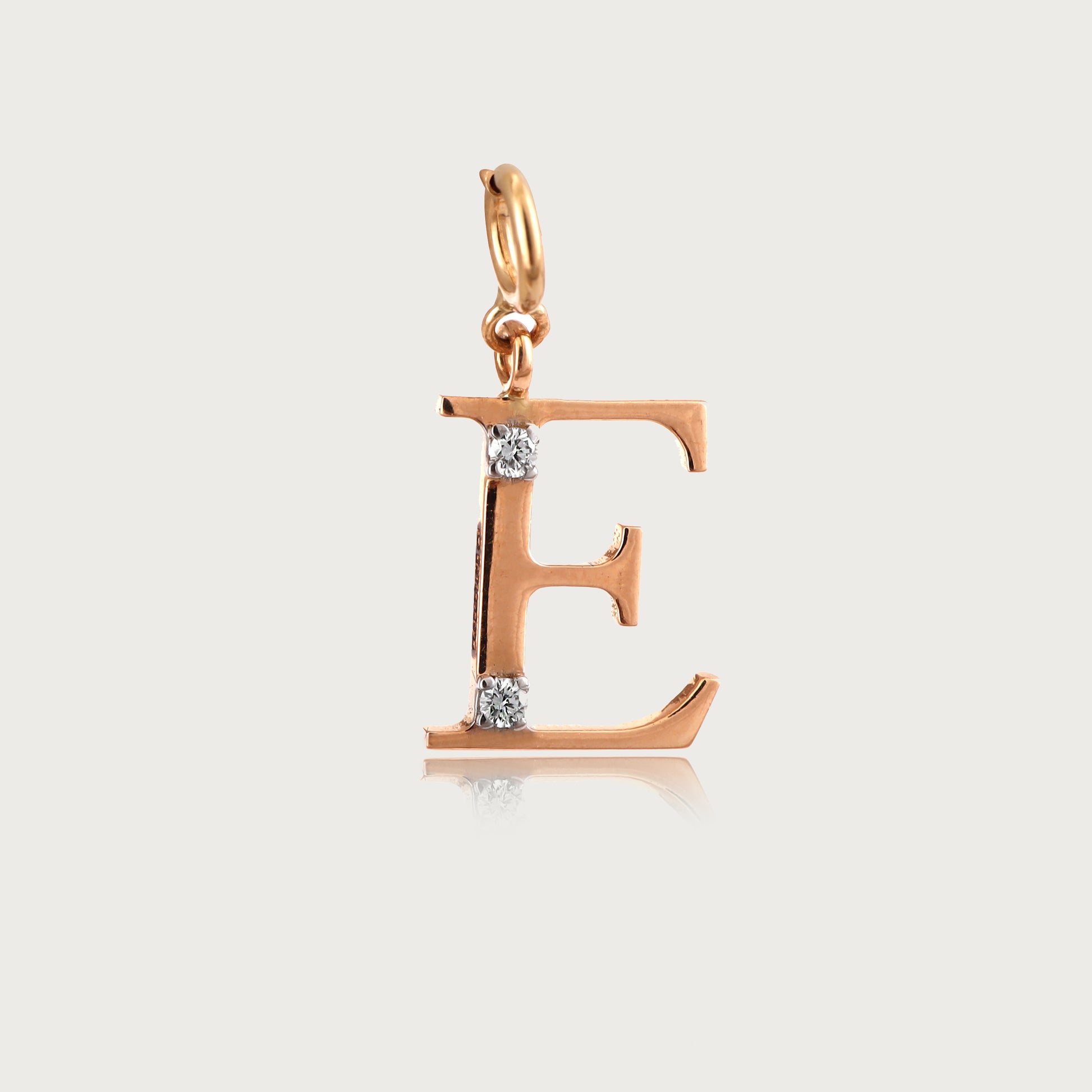 18kt gold "E" initial pendant with VVS diamonds—affordable luxury fine jewellery for women.