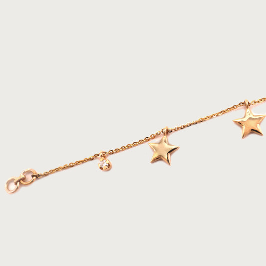 18kt gold star bracelet with VVS diamonds. Fine charm jewellery under ₹50,000. Elegant & gift-worthy for her.