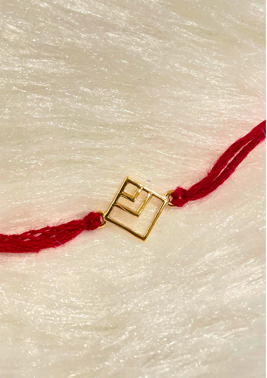18kt gold square pattern rakhi featuring elegant design for Raksha Bandhan under Rs. 10,000