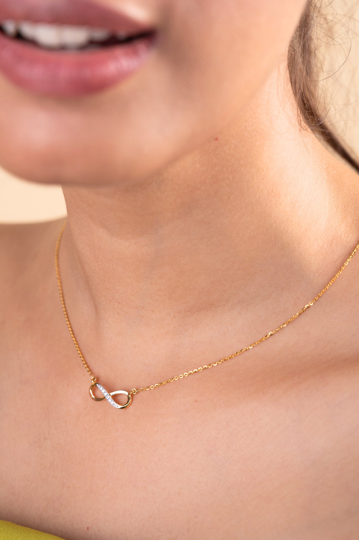 Embrace everlasting elegance with our 18 kt Infinity Diamond Necklace, perfect for everyday wear and effortlessly adding a touch of luxury to any ensemble, whether casual or workwear. It's an ideal gifting idea for her, offering versatility and timeless appeal. Explore our Under 30,000 collection for affordable yet exquisite pieces that promise to elevate your style effortlessly. 