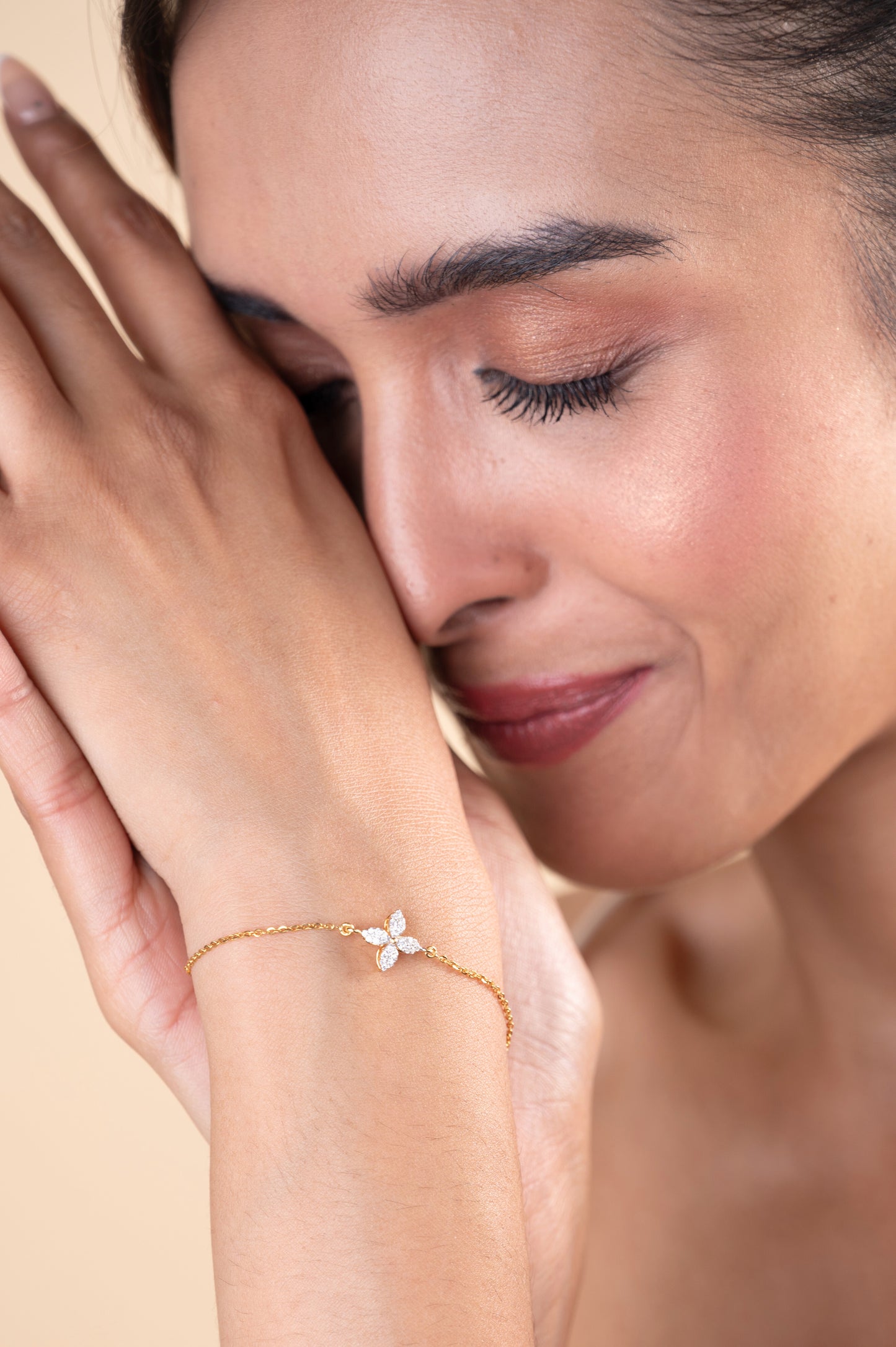 Elevate your everyday style with the Flower Diamond Bracelet in 18kt Gold. Featuring a delicate floral design, this versatile accessory complements both casual and workwear outfits. A thoughtful gift idea for her, priced under Rs. 30,000, this elegant bracelet adds a touch of refined sophistication to any look.