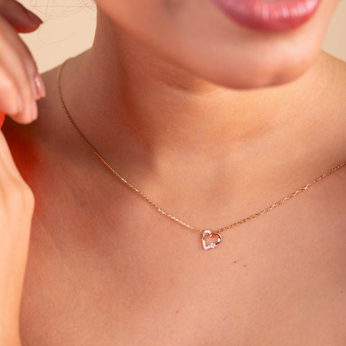 Infuse your style with love through our 18 kt Tiny Heart Pendant from the Spring Edit, priced below Rs. 10,000. Designed to seamlessly transition from day to night, this exquisite jewelry piece adds a touch of charm to any ensemble, making it a perfect addition to her collection or a thoughtful gifting idea.