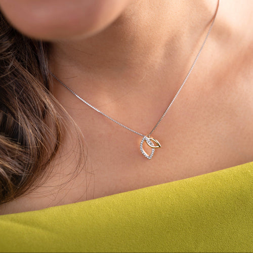 Embrace the essence of everlasting connection with our alluring 18kt gold Entangled Diamond Pendant. Explore timeless beauty with our Spring Diamond Bracelet, a sophisticated piece priced under Rs. 30,000, ideal for everyday wear and thoughtful gifts. This captivating pendant exudes elegance, seamlessly complementing your casual looks, workwear, or special occasions.