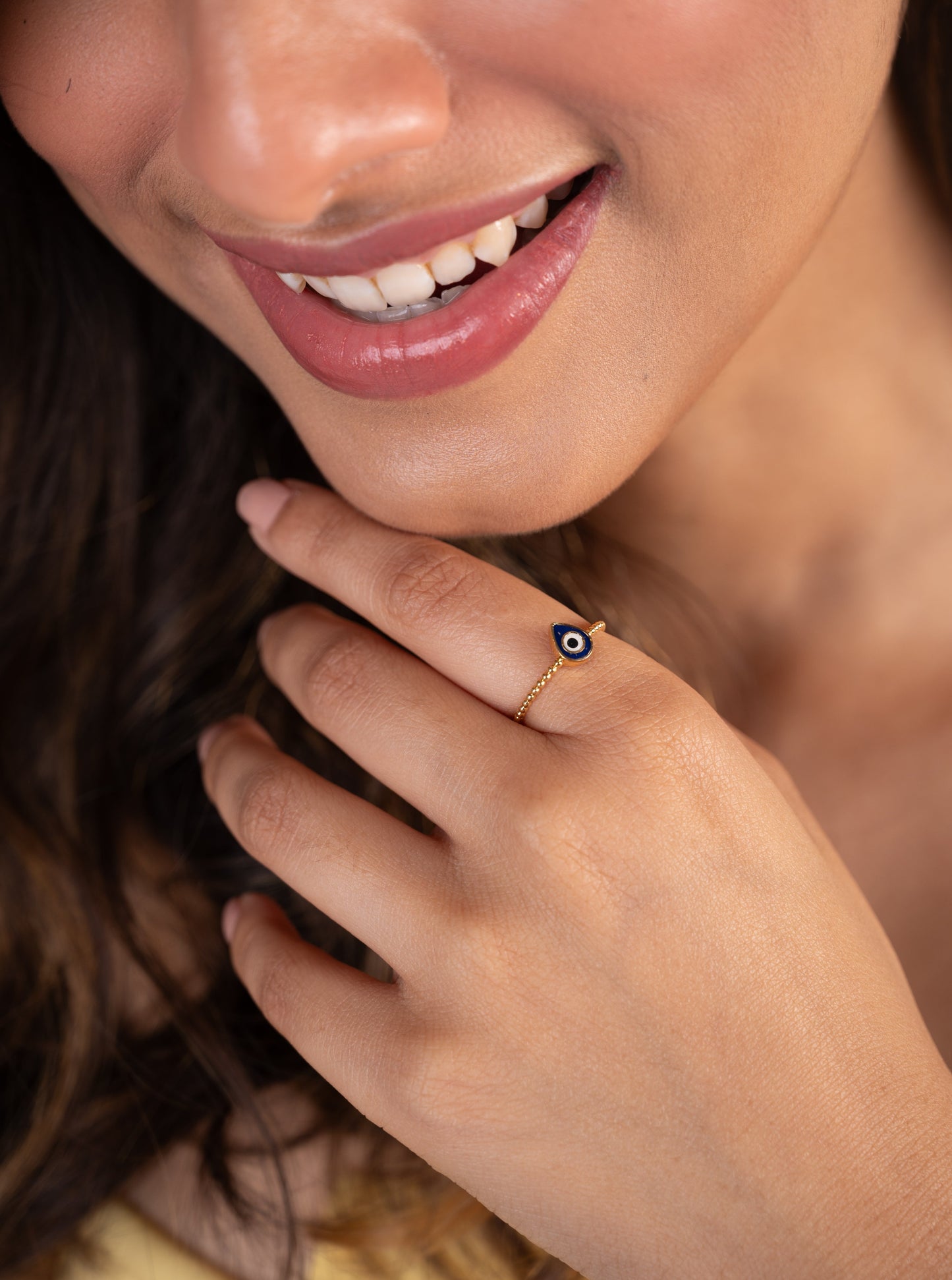 Elevate your style and protect yourself with our stunning 18 kt gold Evil Eye Ring, crafted with Natural Diamonds. This sleek design adds a touch of elegance to your everyday wear, work, or casual looks while warding off negativity. An ideal gift for her.