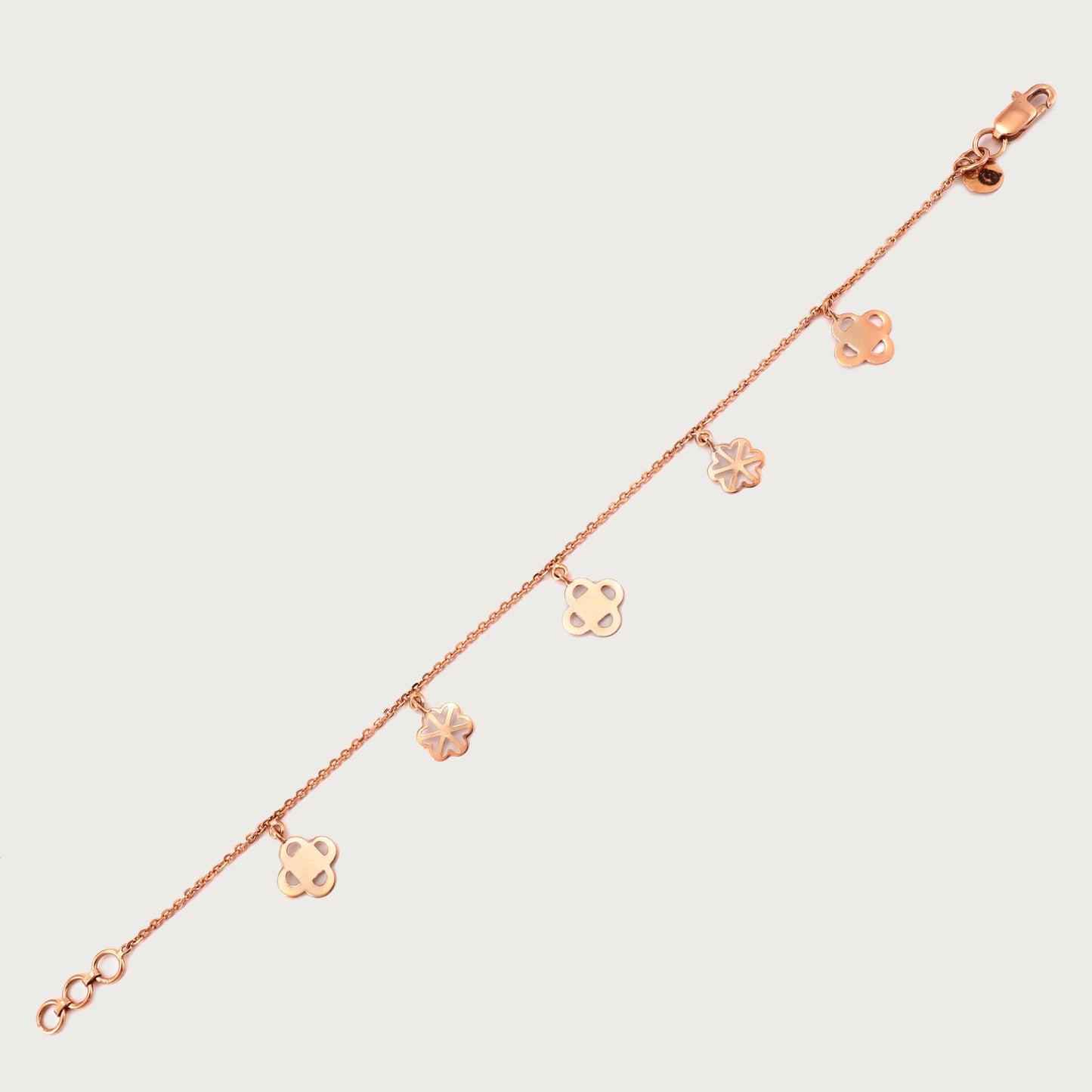 18kt gold charm bracelet. Fine jewellery under ₹30,000. Chic, radiant, gift-worthy.