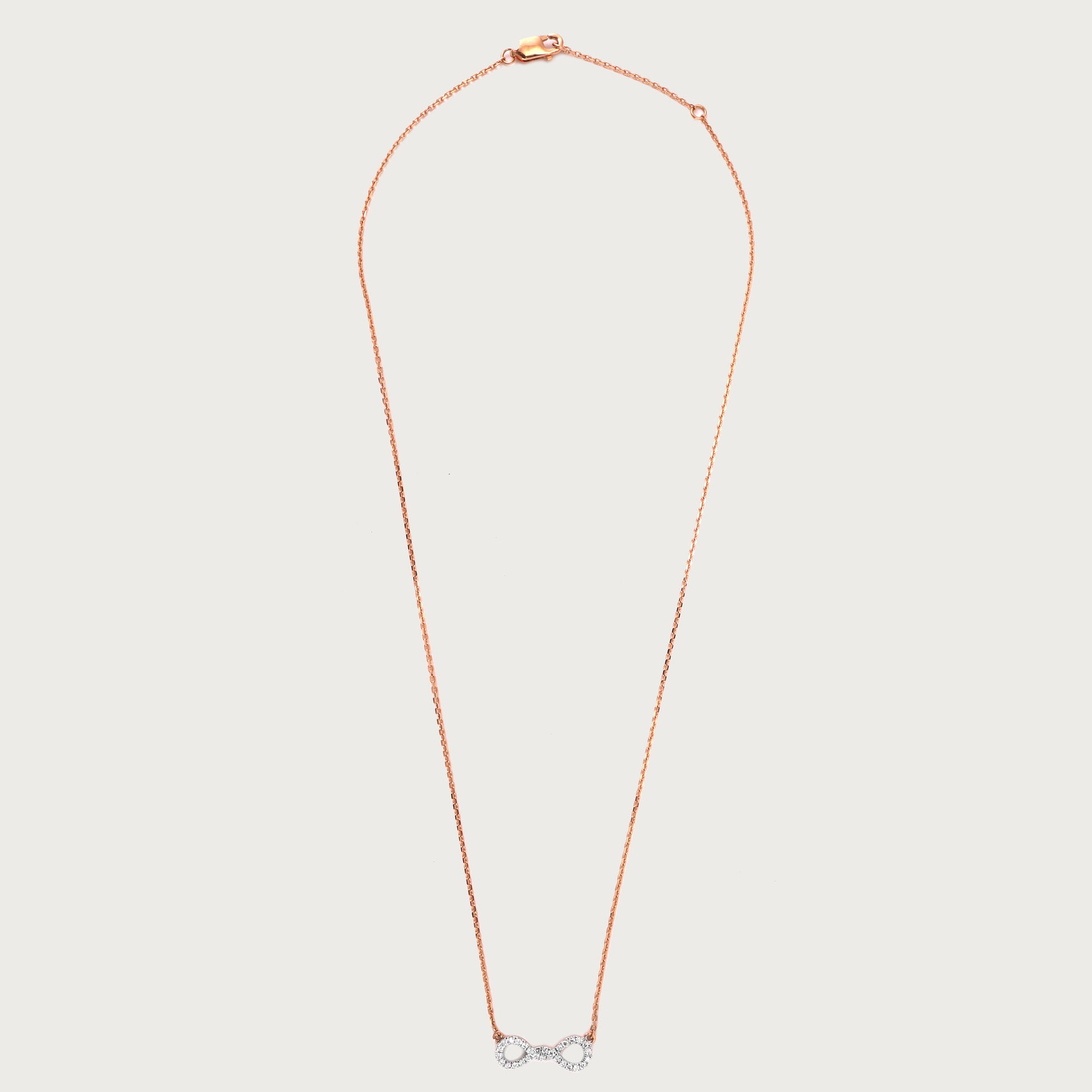 18kt gold Diamond Infinity Necklace with VVS diamonds—timeless fine jewellery under ₹60,000.