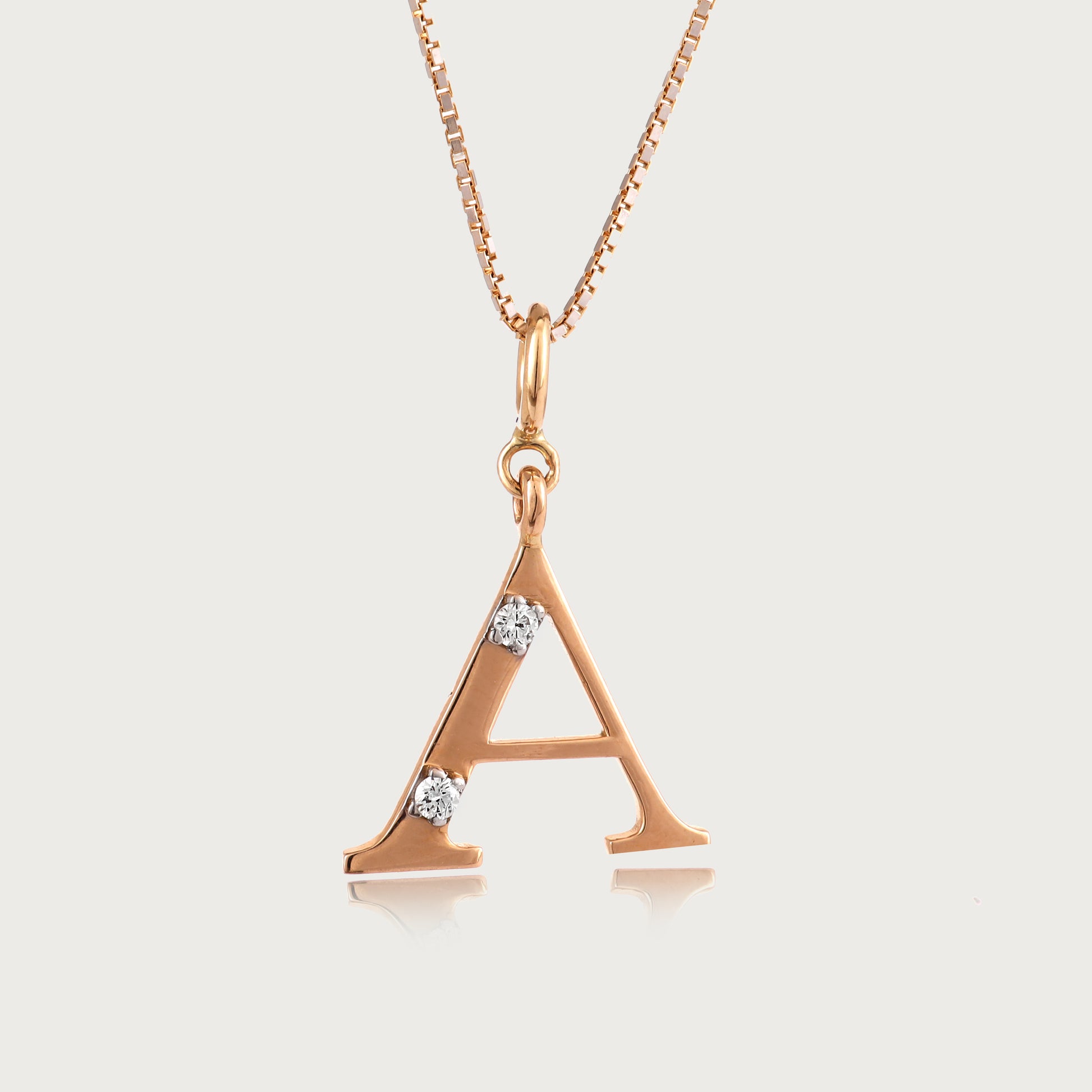 18kt gold "A" initial pendant with VVS diamonds—affordable luxury fine jewellery for women.