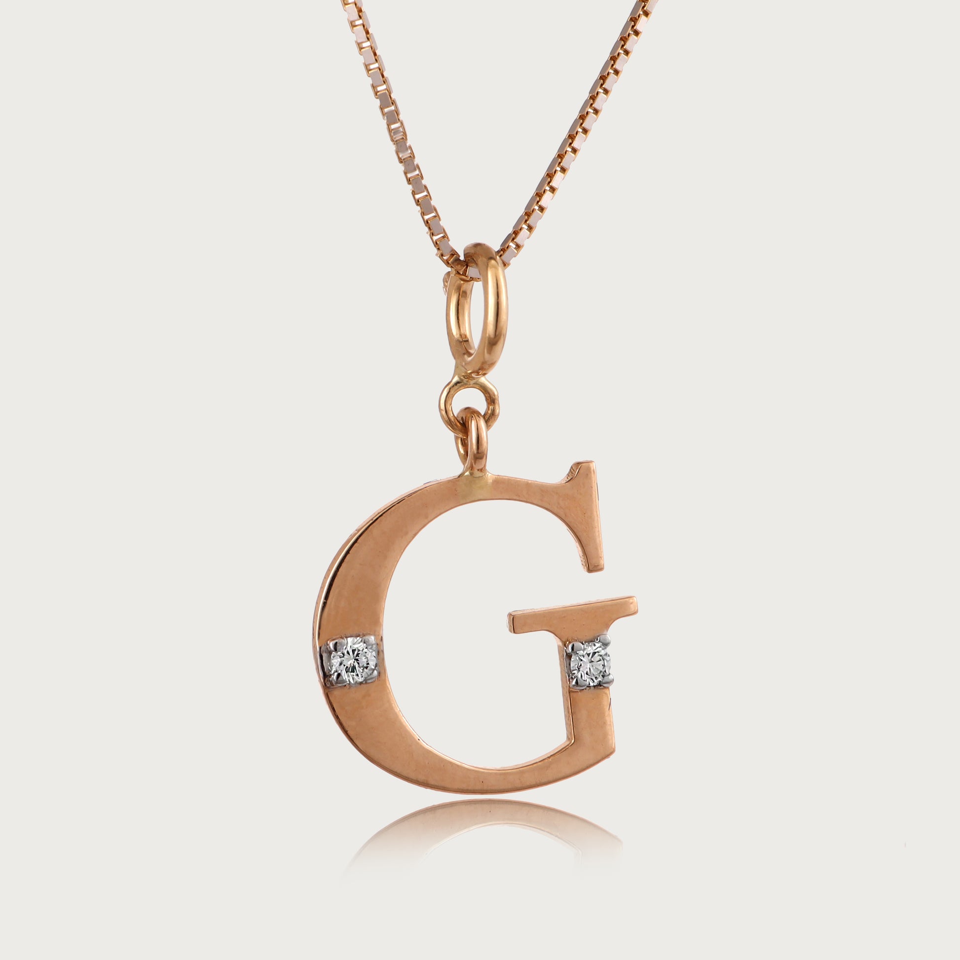 18kt gold "G" initial pendant with VVS diamonds—affordable luxury fine jewellery for her.