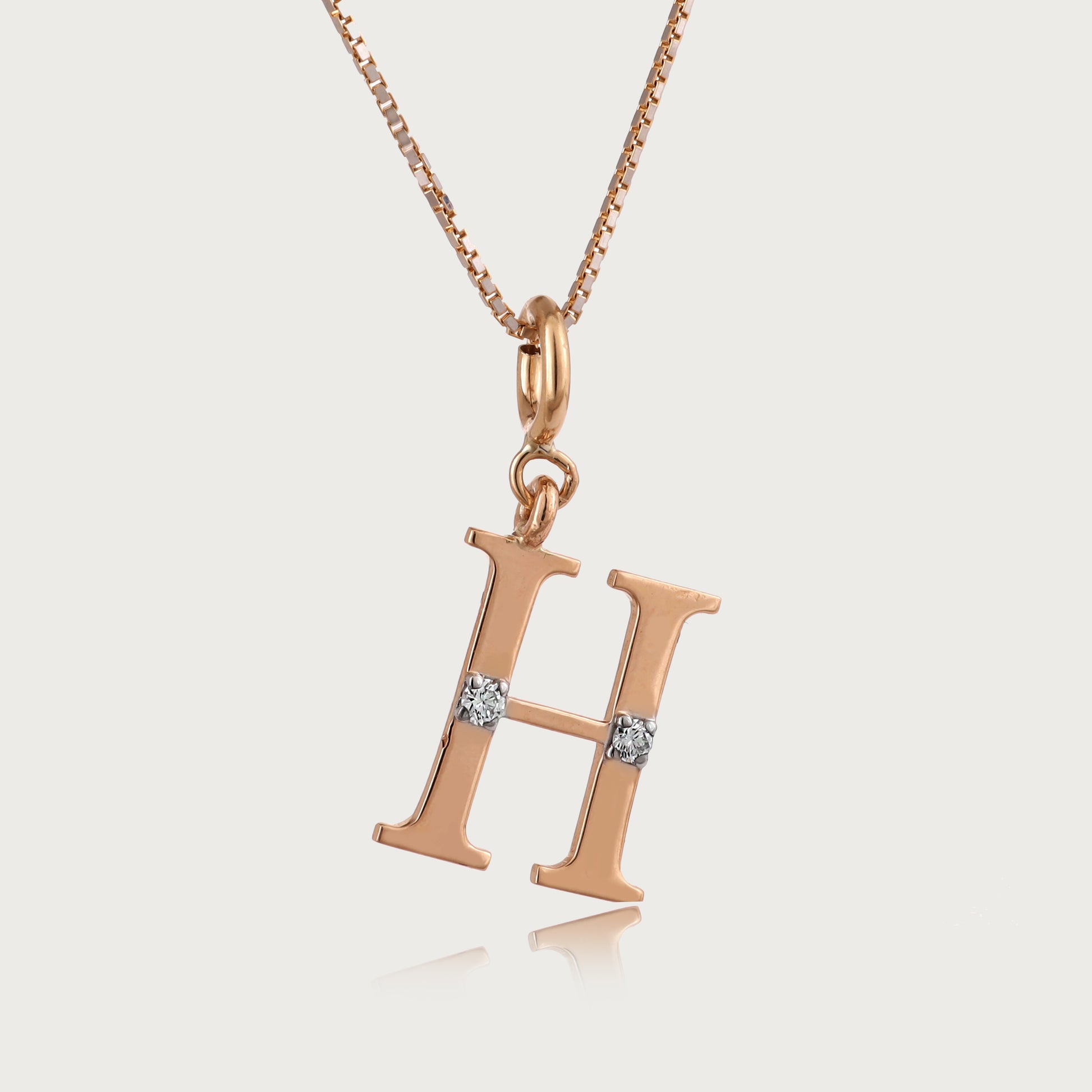 18kt gold "H" initial pendant with VVS diamonds—luxury fine jewellery under ₹15,000 for her.