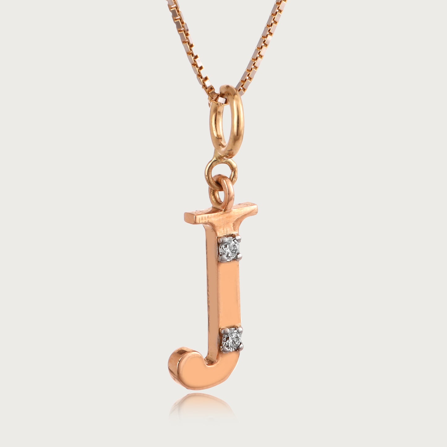 18kt gold "J" initial pendant with natural VVS diamonds – stylish, affordable fine jewellery.