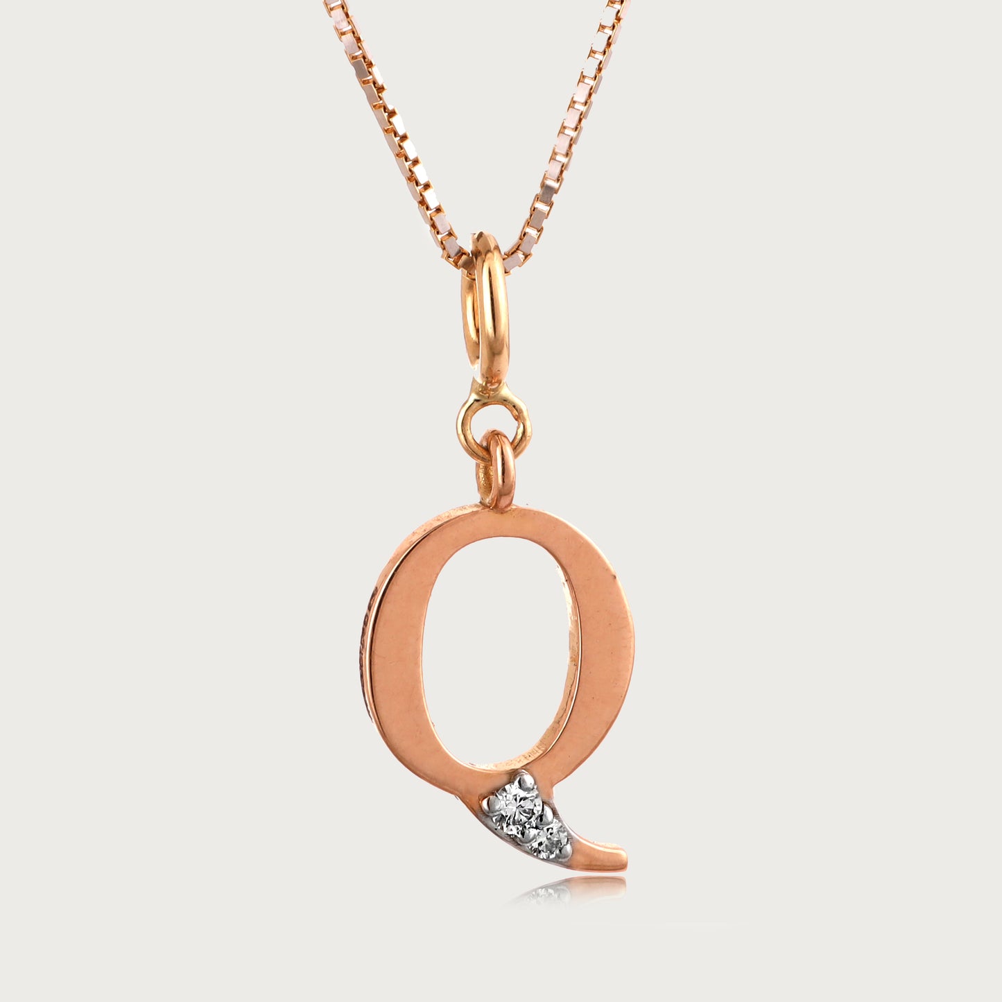 18kt gold "Q" initial pendant with natural diamonds—personalized fine jewellery under ₹15,000.