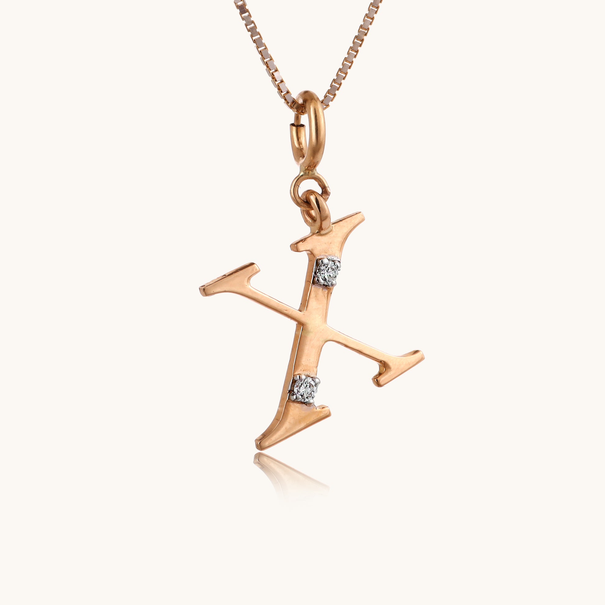 18kt gold "X" pendant with VVS diamonds—stylish, affordable fine jewellery for modern elegance under 15,000.