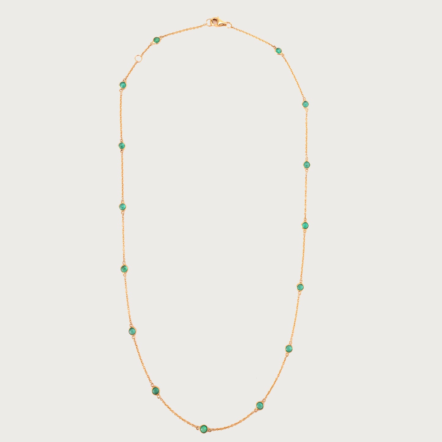18kt gold emerald necklace. Fine jewellery under ₹50,000. Chic, timeless, luxe.