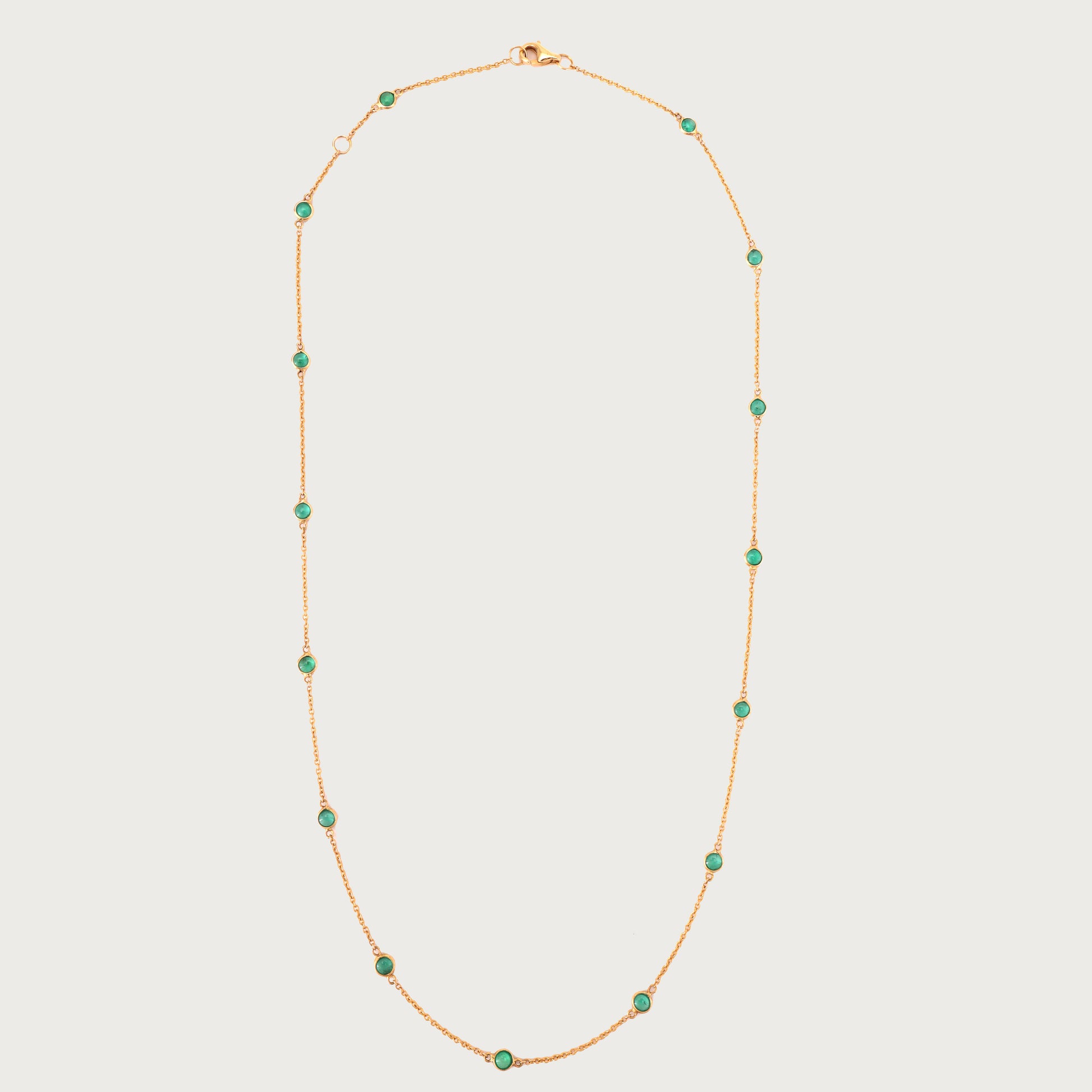 18kt gold emerald necklace. Fine jewellery under ₹50,000. Chic, timeless, luxe.
