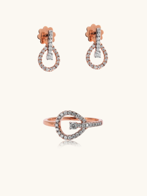 Elegant 18kt gold diamond ring & earrings—affordable, minimal fine jewellery set for modern women under Rs. 80,000