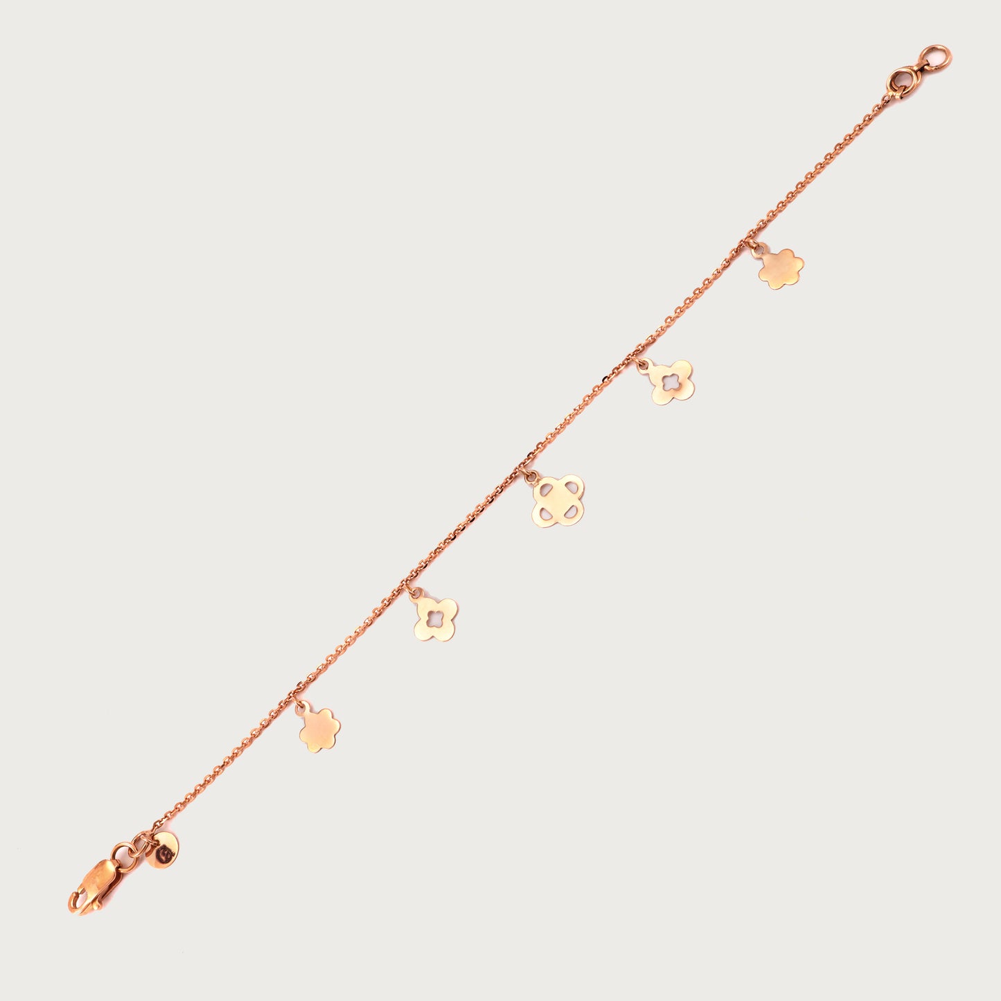 18kt gold floral bracelet. Fine jewellery under ₹30,000. Delicate, chic, timeless.