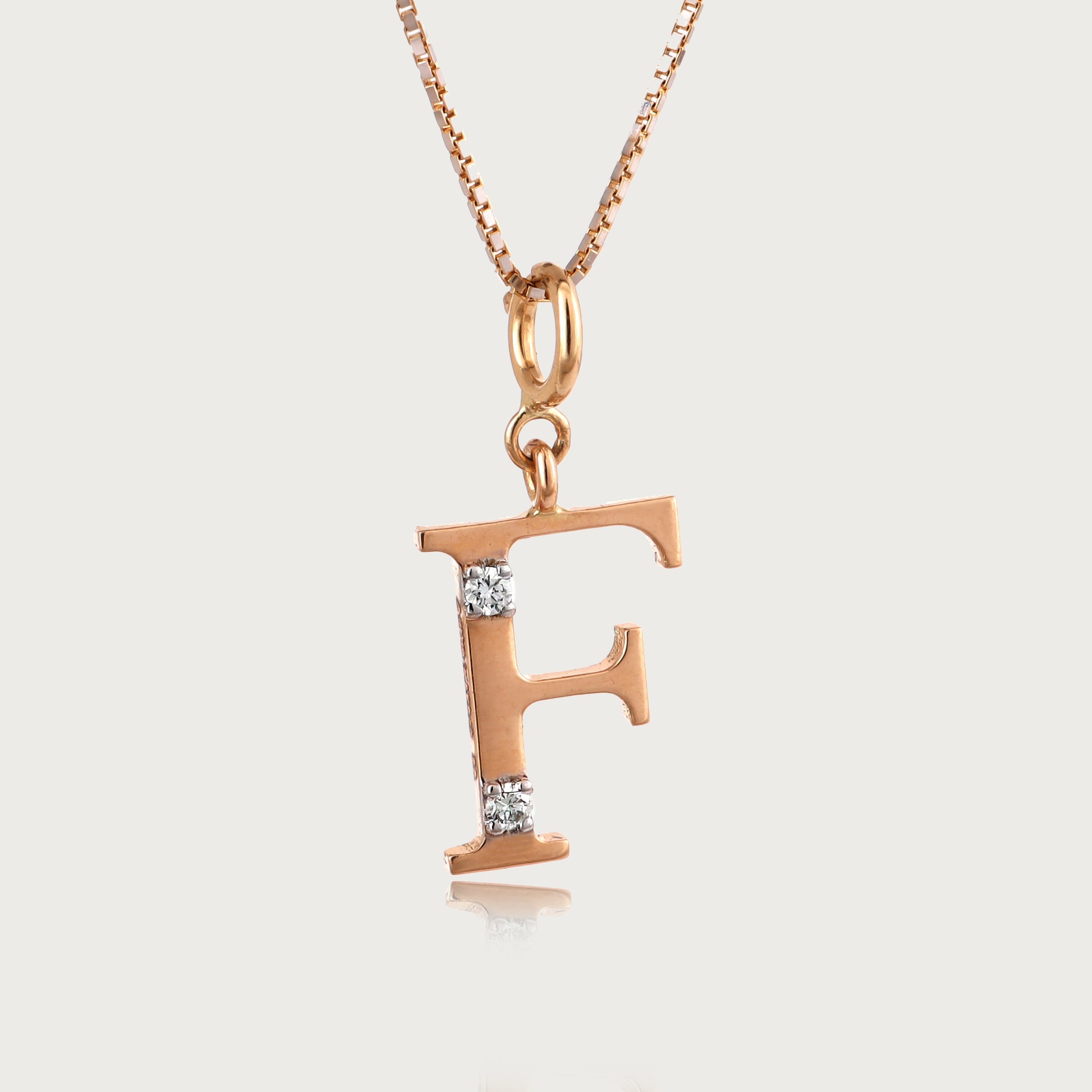 18kt gold "F" initial pendant with VVS diamonds—affordable luxury fine jewellery for women.