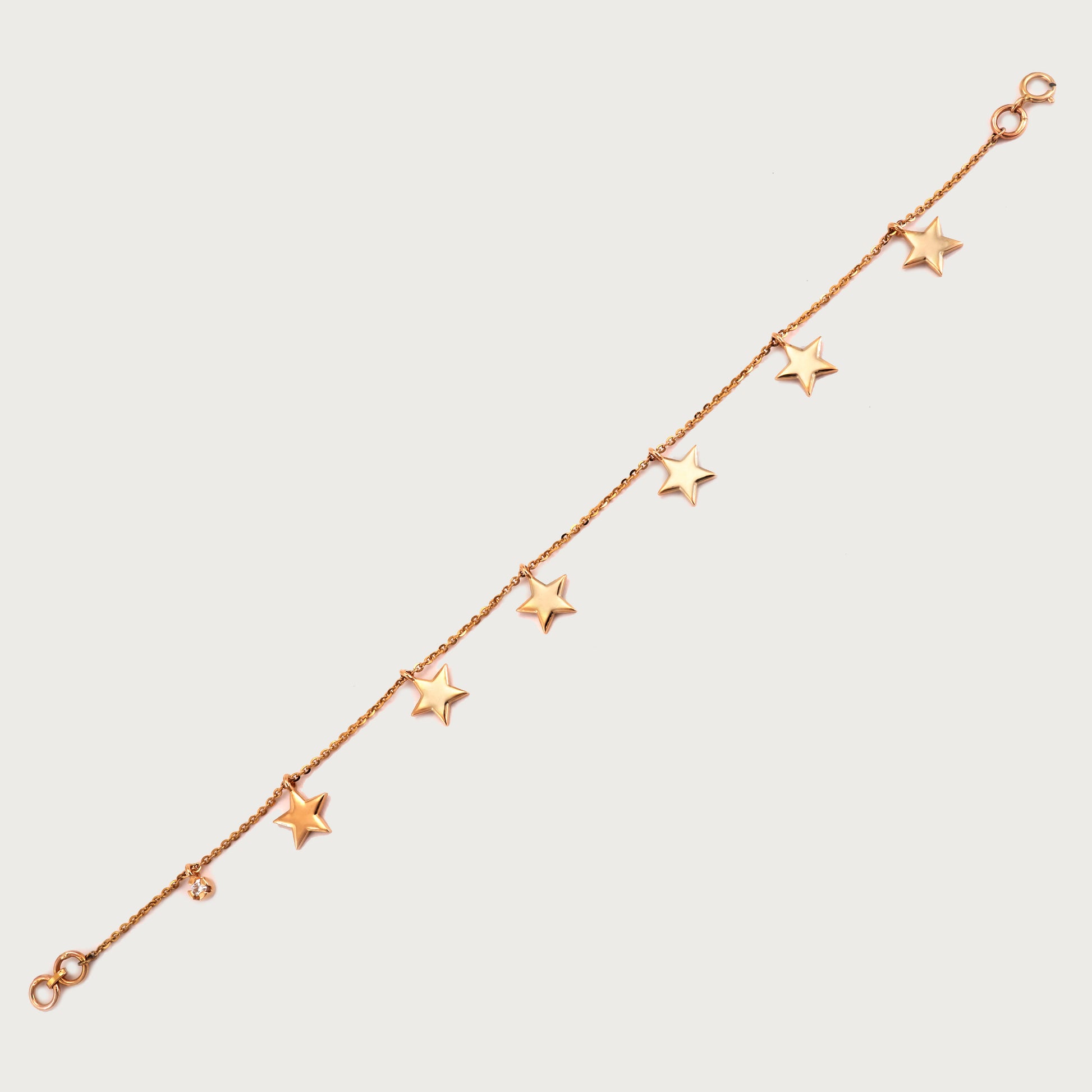 18kt gold star bracelet with VVS diamonds. Fine charm jewellery under ₹30,000. Elegant & gift-worthy for her.