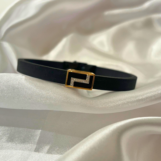 Zigzag-patterned men’s bracelet in 18kt gold with 0.04 ct natural diamond, featuring a sleek black band—crafted for bold, everyday elegance under ₹30K.
