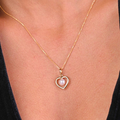 Heart Pearl Gold Pendant in 18kt gold & pearl; BIS-certified minimalist jewelry, a perfect gift for her online under 15,000!
