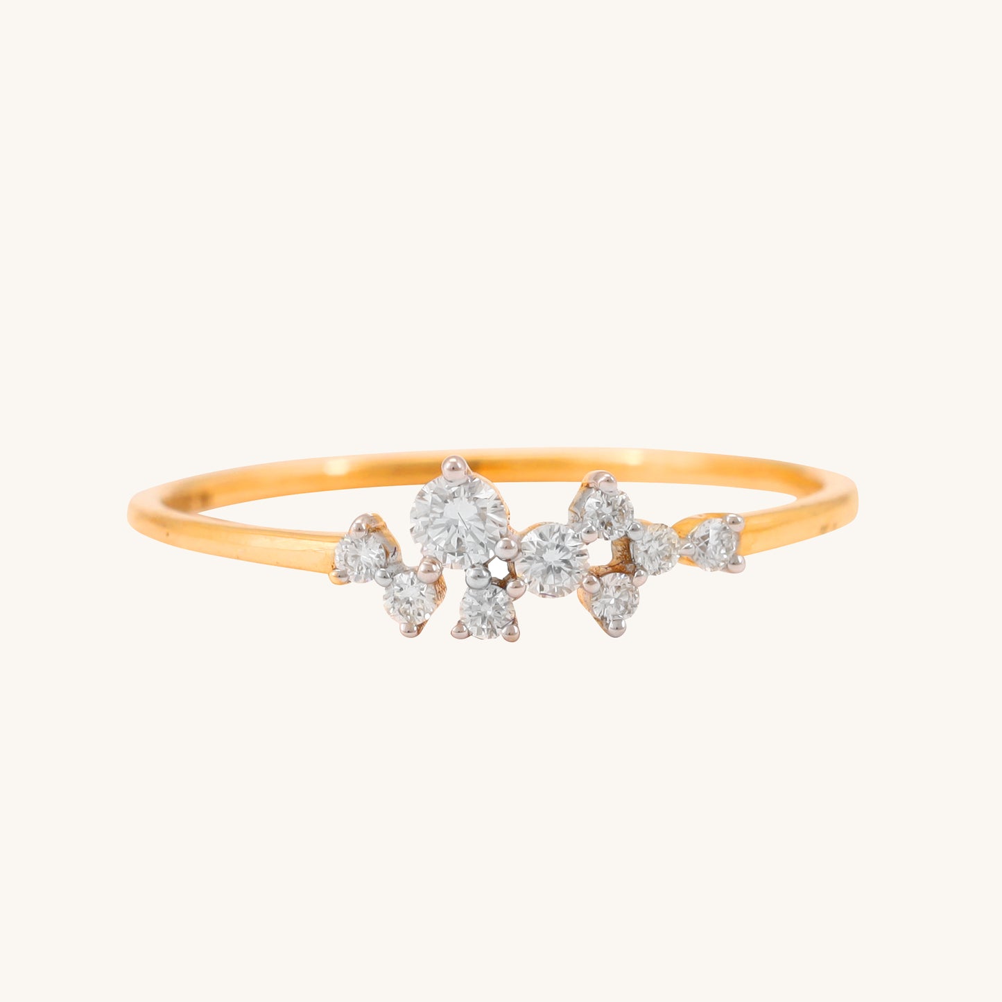 Elevate your look with our stunning 18kt gold ring, adorned with a delicate cluster of sparkling diamonds. Whether for everyday wear or special occasions, this ornate design exudes timeless elegance, adding a touch of sophistication to any outfit. Priced under Rs. 30,000, it makes a thoughtful gifting idea for her. Effortlessly transition from work to weekend with this versatile piece.