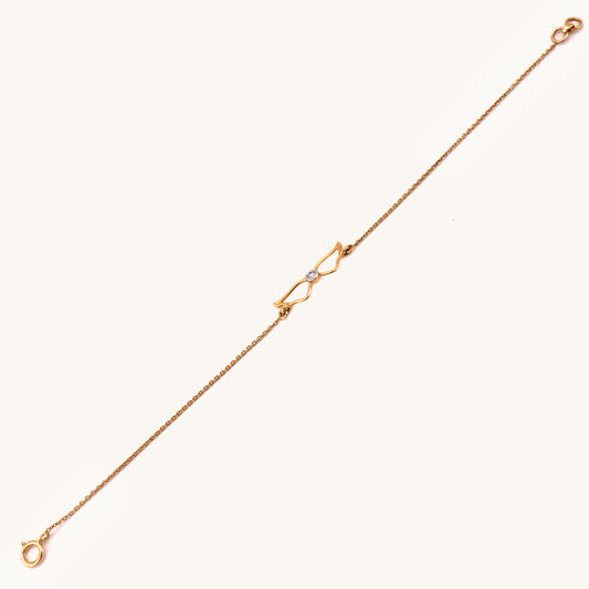 Luxurious 18kt gold Winged Diamond Bracelet elevates everyday style. Delicate and eye-catching, this bracelet transitions flawlessly from workwear to casual looks. Perfect gift under Rs. 30,000.