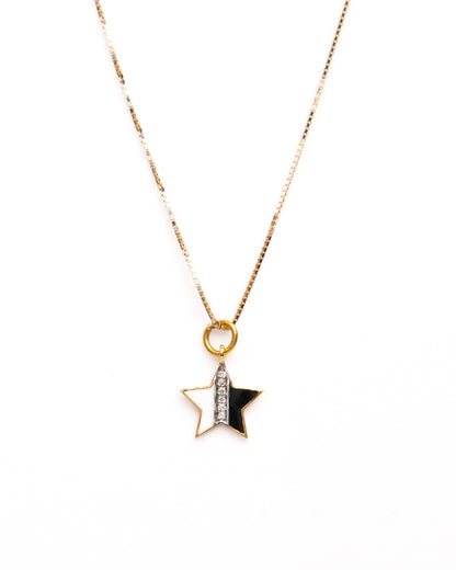 Add a touch of celestial elegance to your everyday wear with our 18kt Gold B&W Star Charm. This versatile piece is ideal for daily wear for Women. An affordable gifting option for her under 10,000.