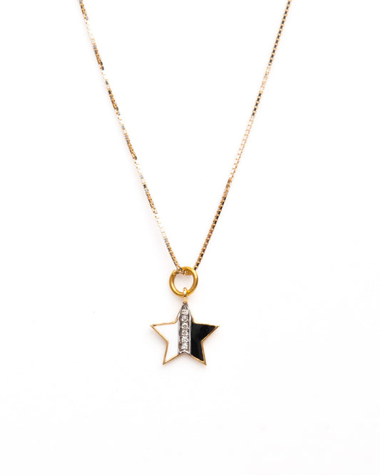 Add a touch of celestial elegance to your everyday wear with our 18kt Gold B&W Star Charm. This versatile piece is ideal for daily wear for Women. An affordable gifting option for her under 10,000.