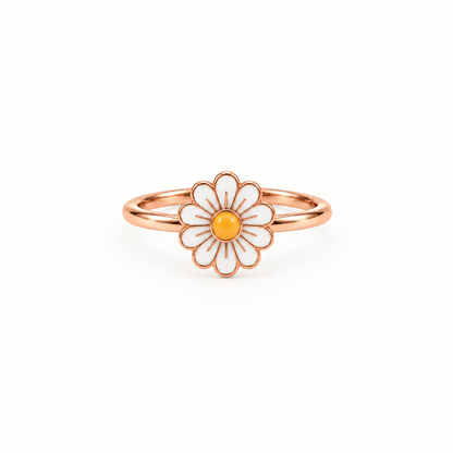 Rose gold ring with a white enamel daisy flower and a yellow center. Cute gifts for kids under Rs. 20,000