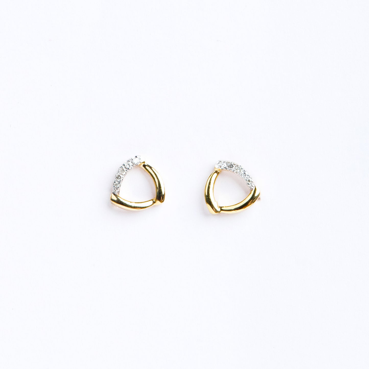 Upgrade your everyday elegance with our Dainty Diamond Earring. Crafted in luxurious 18kt gold. With a lightweight design perfect for daily wear, it's an ideal addition to your workwear edit or a thoughtful gift for her. Explore our affordable collection, all under 30,000, and elevate your everyday style effortlessly.  