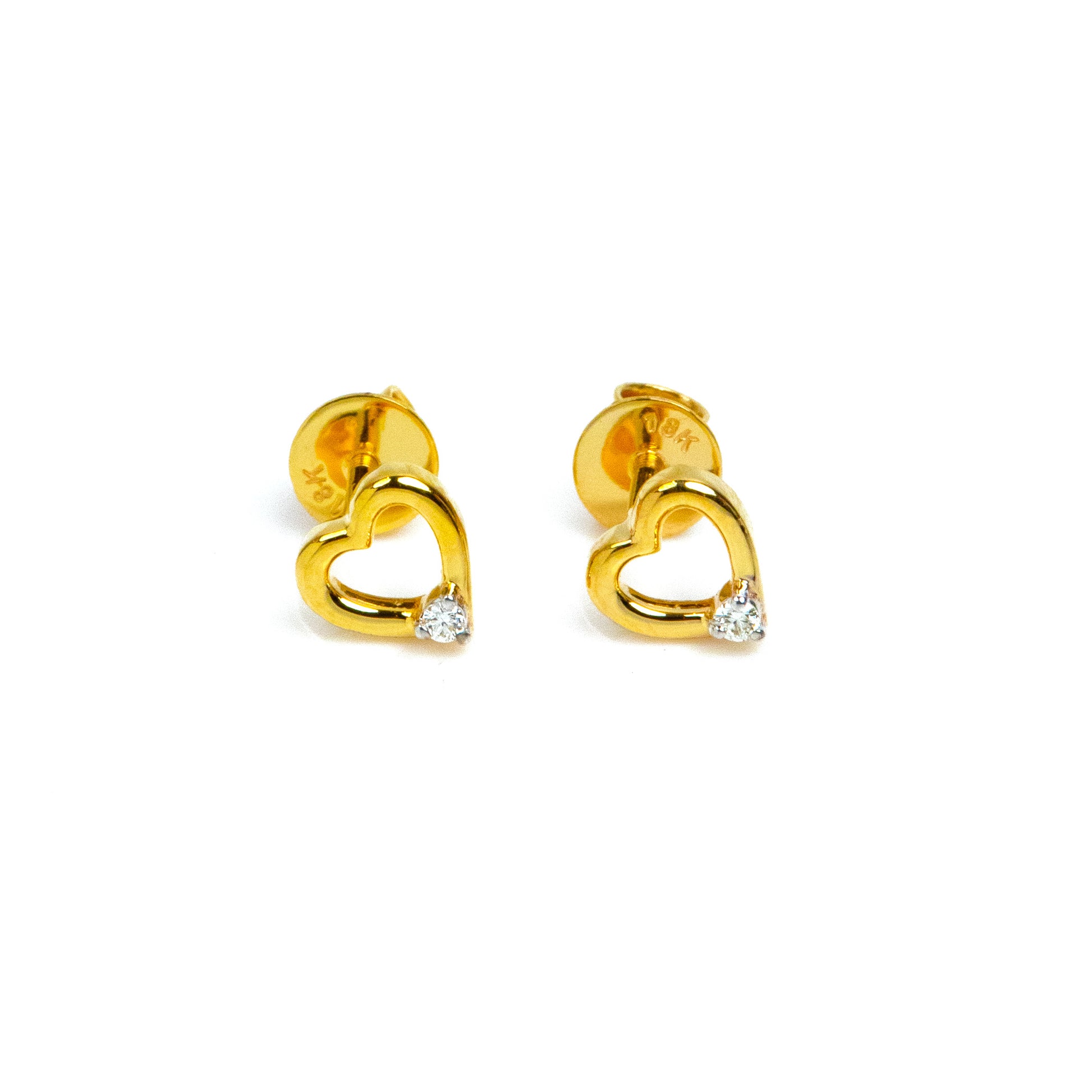 Heart-Stud Earring, a symbol of love and elegance, crafted in exquisite 18kt gold. Perfect for everyday wear for women, its delicate design adds a touch of sophistication to any outfit. Affordable collection under 30,000 for gifting ideas. Perfect jewellery addition to your 9 to 5 collection.